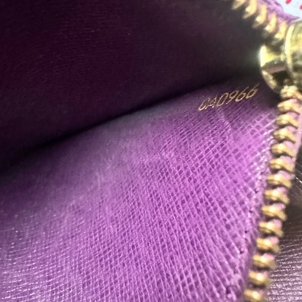Louis Vuitton Yellow Epi Long Wallet with Purple Interior.